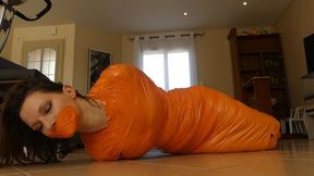Chloe full mummification in orange tape