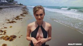 Glam cutie gives a dude a sudden blowjob at the seashore