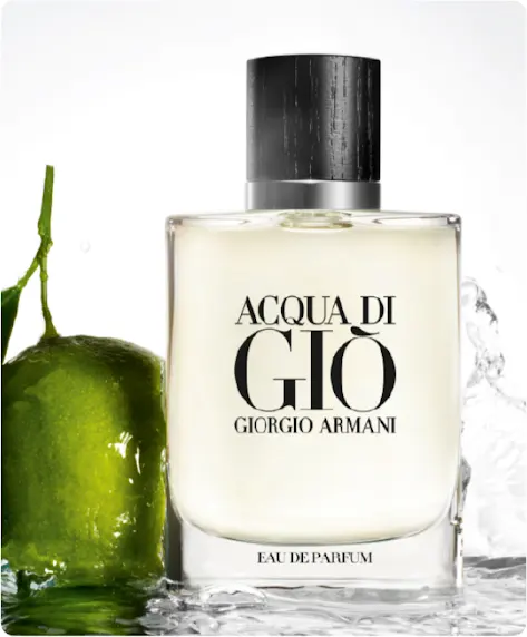 A bottle of Acqua Di Gio perfume next to a lime.